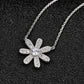 Flower Necklace for Women, Seven Petal Floral Centerpiece with Faceted Details, Dainty Botanical Jewelry for Daily Style