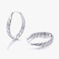 hoop earrings for women, twisted hoop earrings, chunky hoop earrings, geometric earrings, medium hoop earrings, oval earrings, sculpted earrings, textured hoop earrings, modern jewelry, fashion accessories