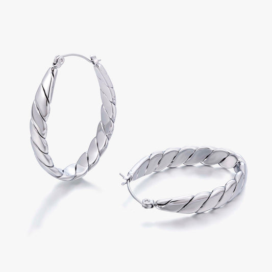 hoop earrings for women, twisted hoop earrings, chunky hoop earrings, geometric earrings, medium hoop earrings, oval earrings, sculpted earrings, textured hoop earrings, modern jewelry, fashion accessories